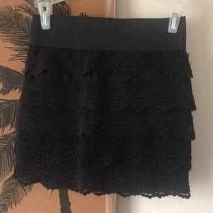 Tight black lace skirt